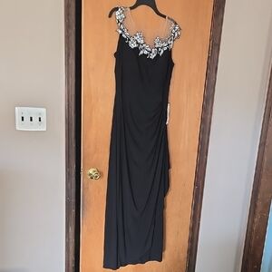 Macys Black Gown With Flowers Around The Neck.